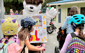 Children with school mascot